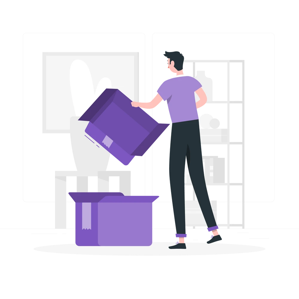 A man engaged in the task of organizing boxes.